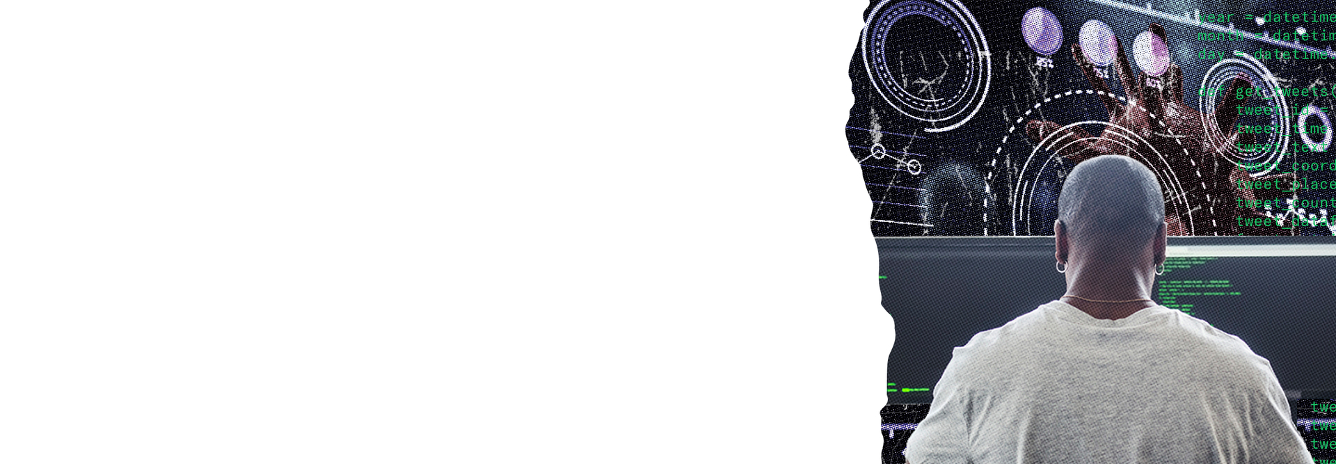 2台のモニターとダッシュボードの前でコーディングする男性