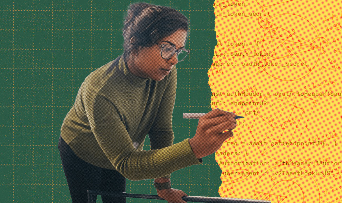 ボードに数式を書く女性の画像